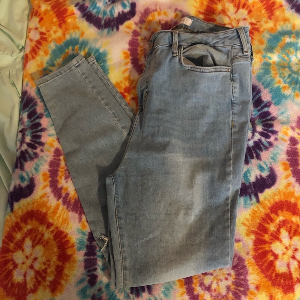 High-Waisted Ripped Jeans